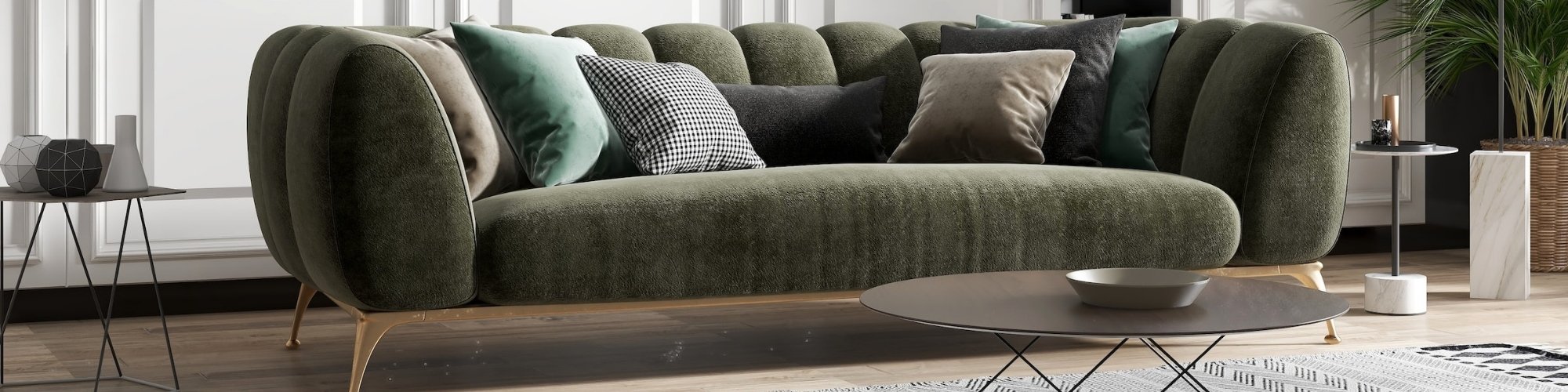 Stylish living room with green velvet sofa and light hardwood floors